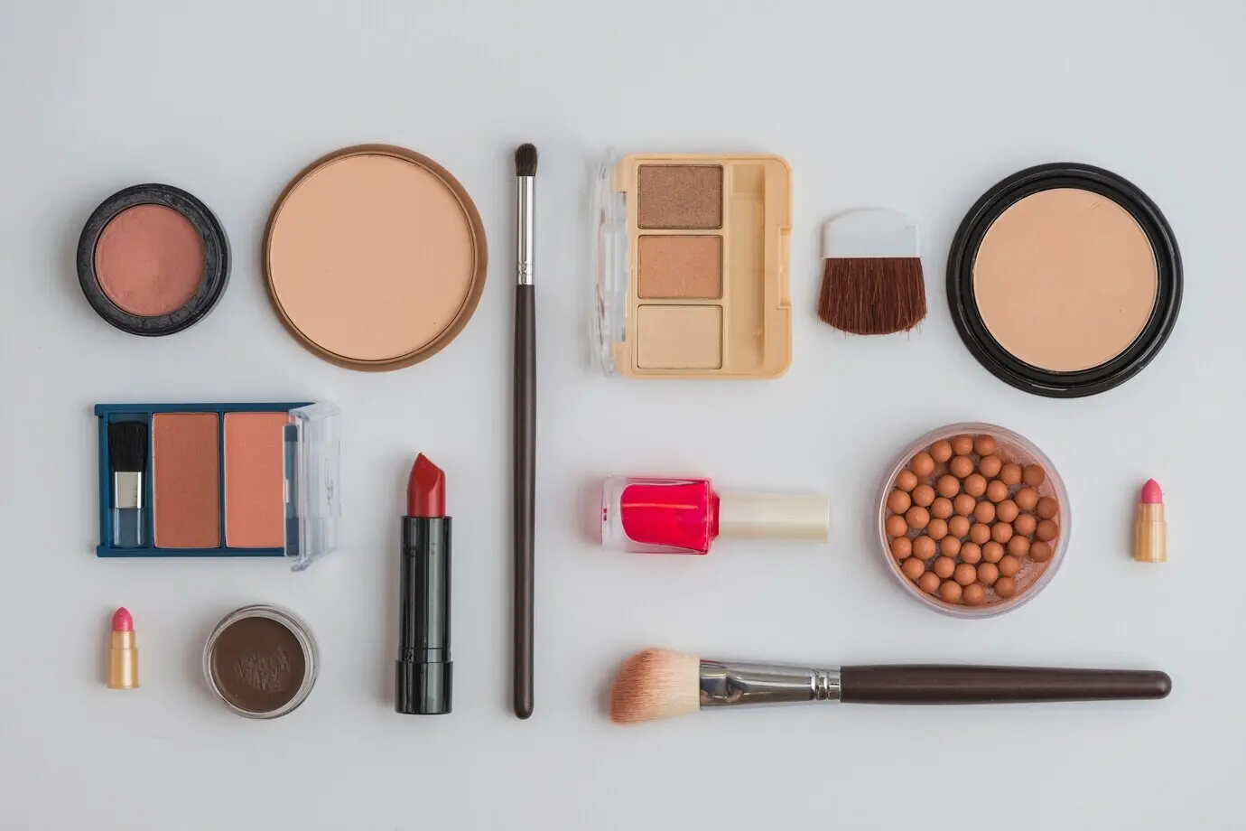 Flat-lay composition featuring a cosmetic product